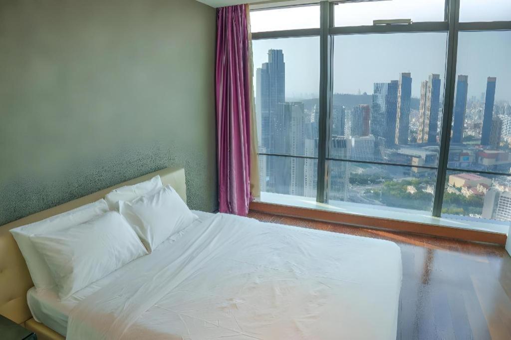 Grand Madison Qingdao Harbour-View Central（Former Qingdao Farglory Hotel） Екстериор снимка