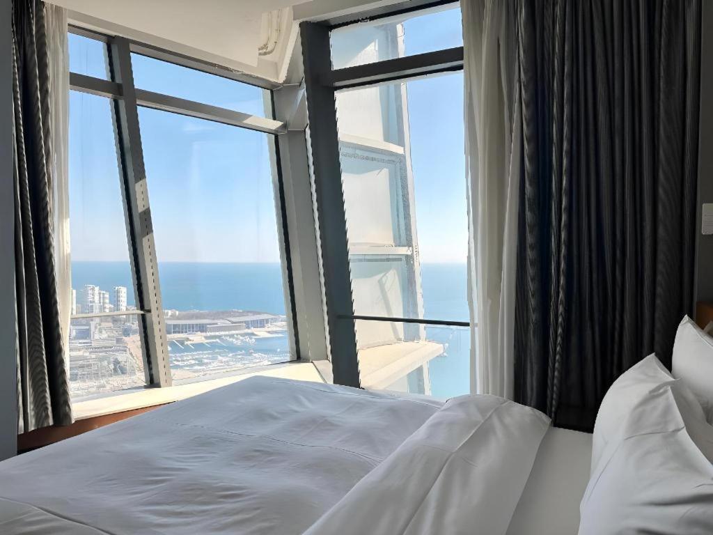 Grand Madison Qingdao Harbour-View Central（Former Qingdao Farglory Hotel） Екстериор снимка